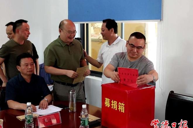 澧县玉圃村开展捐资助学活动