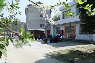 沈昌健：“两会”归来忙宣讲 春风吹入花田中